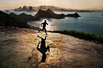 Steve McCurry - Steve McCurry Man Running at Dawn