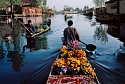 Steve McCurry, Merchants Paddle Boats
1998, FujiFlex Crystal Archive Print
