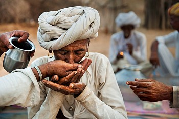 Steve McCurry - Steve McCurry Man Participates in Opium Ceremony