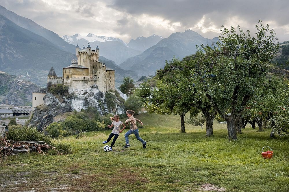 Steve McCurry, Two Girls Play, Saint Pierre, Aosta Valley, Italy, 2016
FujiFlex Crystal Archive Print, 30 x 40 in. (Inquire for additional sizes)
ITALY-10848NF4
