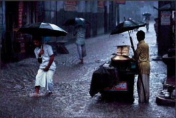 Work: Steve McCurry Man in Monsoon, Ed. 2/6