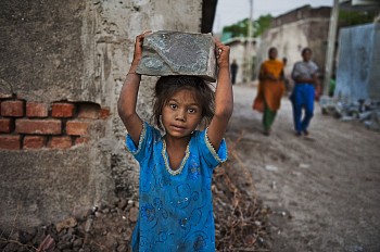 Work: Steve McCurry Girl Carries Rock