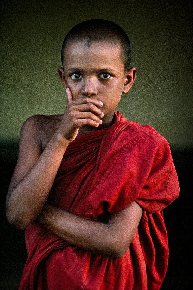 Steve McCurry, Novice Monk Covers Mouth, 1995
FujiFlex Crystal Archive Print
Price/Size on request