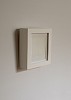 white polaroid wall