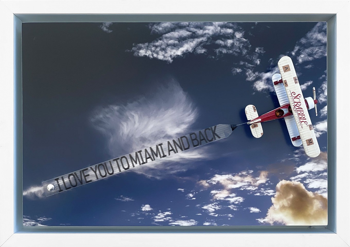 Debranne Cingari, Our Place Forever: I Love You to Miami and Back, 2025
Dye sublimated aluminum print with assemblage toy plane and banner, 9 5/8 x 13 3/8 x 3 1/2 in. (24.4 x 34 x 8.9 cm)
DC251103